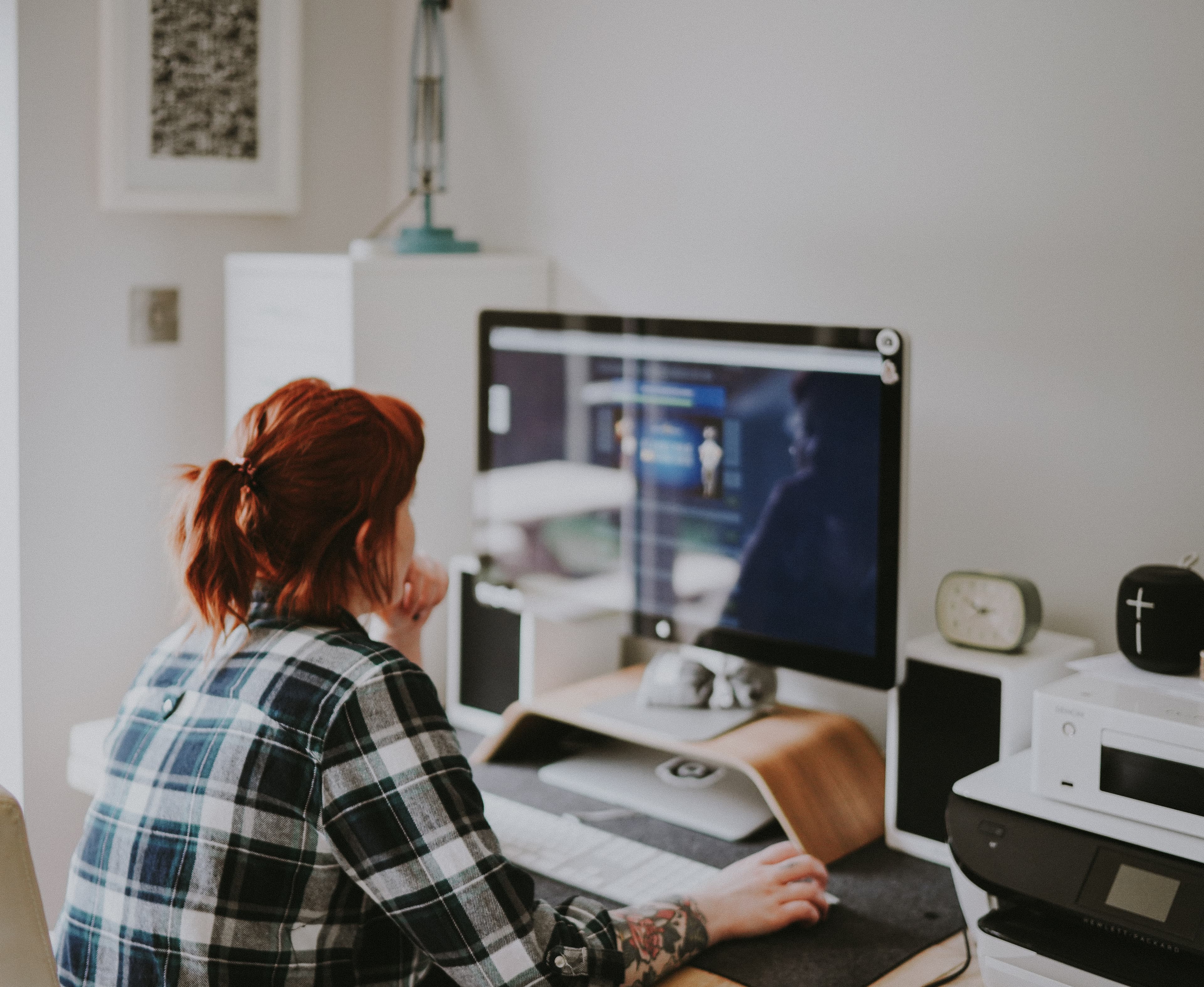 Image of woman working on a computer